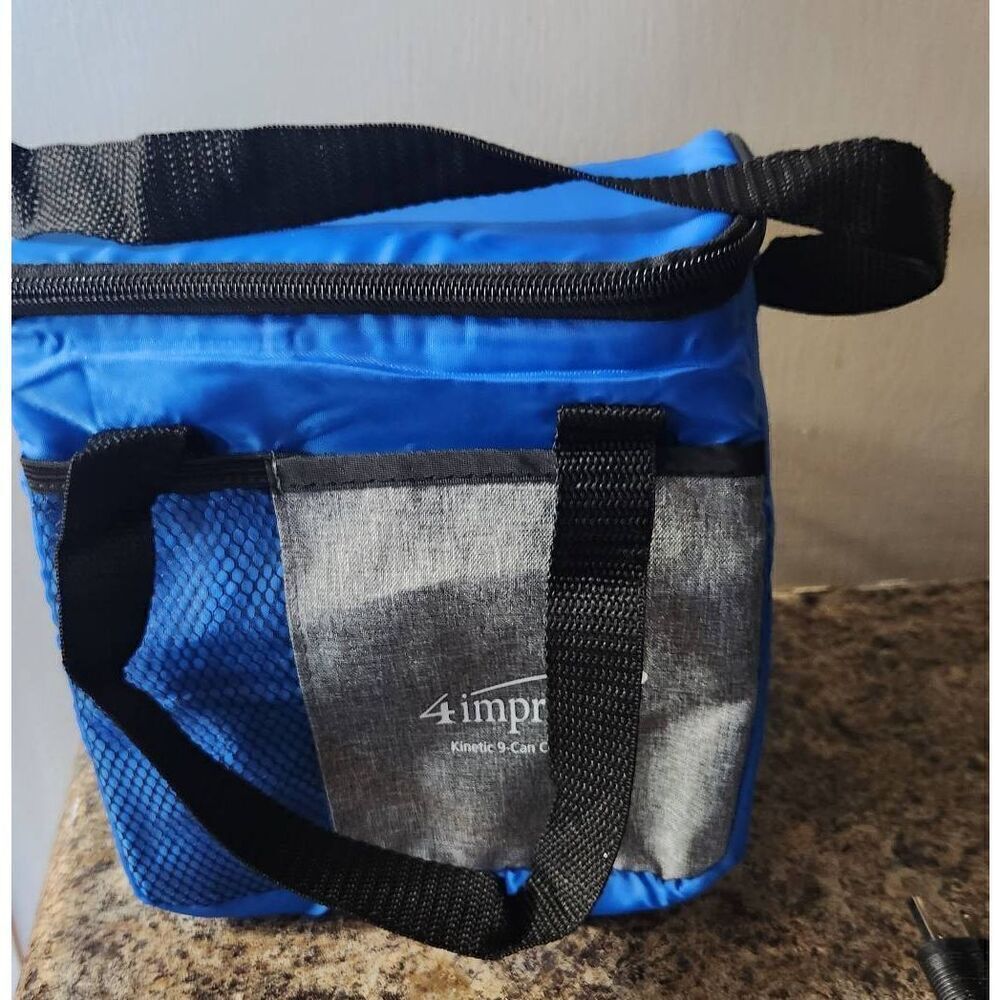 Blue soft side cooler fits 9 cans New